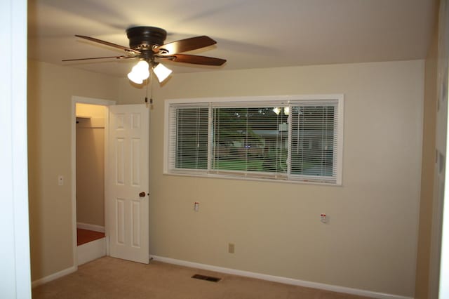 4838 Glenmar Cir, Chattanooga, TN 37416 - empty room featuring a ceiling fan and light colored carpet