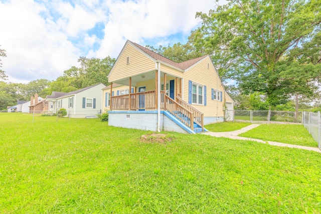 129 N Moore Rd, Chattanooga, TN 37411 - bungalow-style home featuring a porch and a fenced backyard