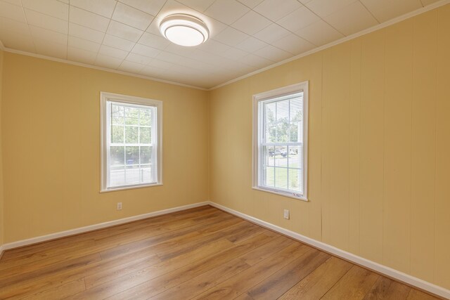 129 N Moore Rd, Chattanooga, TN 37411 - empty room featuring light wood-type flooring, plenty of natural light, and crown molding