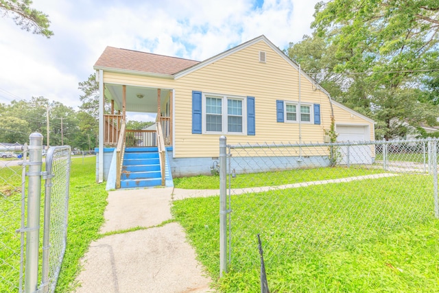 129 N Moore Rd, Chattanooga, TN 37411 - view of front facade featuring covered porch, a garage, a shingled roof, and crawl space