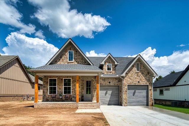 824 Lower Mill Rd, Hixson, TN 37343 - craftsman-style home featuring stone siding, a porch, driveway, and a shingled roof