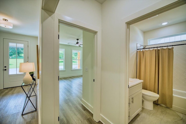 824 Lower Mill Rd, Hixson, TN 37343 - full bathroom with vanity, shower / tub combo with curtain, a ceiling fan, and wood finished floors