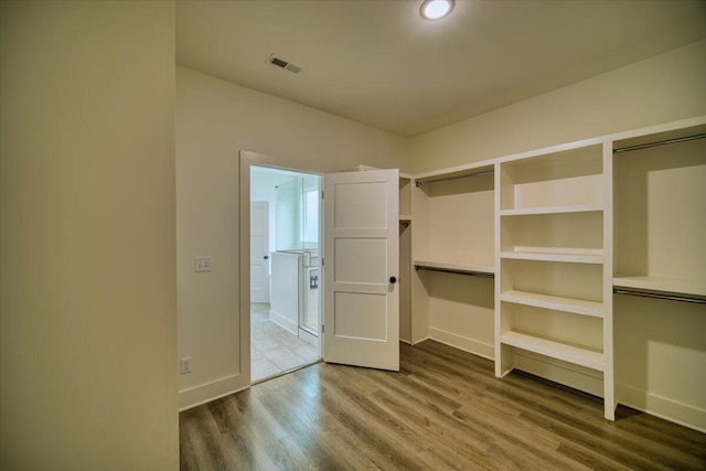 824 Lower Mill Rd, Hixson, TN 37343 - walk in closet with wood finished floors