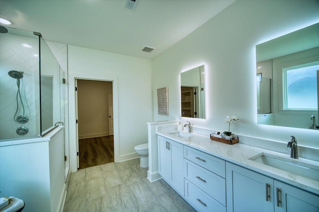824 Lower Mill Rd, Hixson, TN 37343 - full bath featuring tiled shower, double vanity, and marble finish flooring