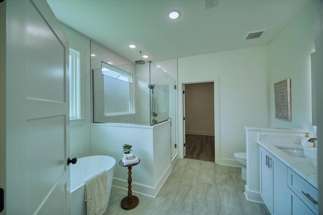 824 Lower Mill Rd, Hixson, TN 37343 - bathroom with tiled shower, a freestanding bath, vanity, and recessed lighting