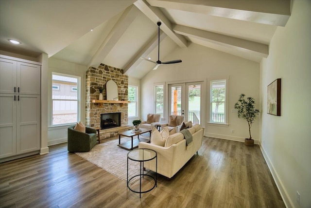 824 Lower Mill Rd, Hixson, TN 37343 - living area featuring french doors, beamed ceiling, wood finished floors, a fireplace, and a ceiling fan