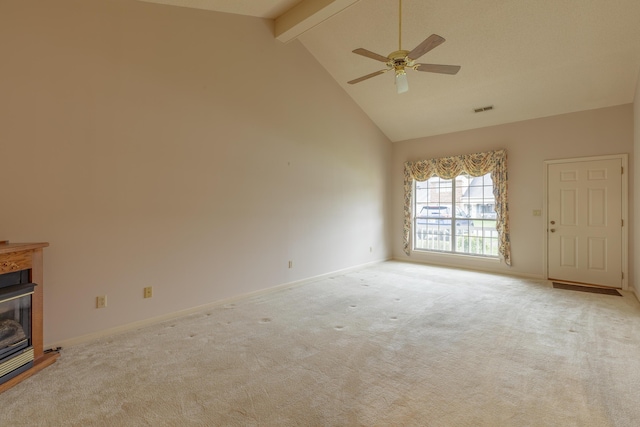 6580 Hickory Meadow Dr, Chattanooga, TN 37421 - unfurnished living room featuring light colored carpet, a ceiling fan, beam ceiling, a glass covered fireplace, and high vaulted ceiling