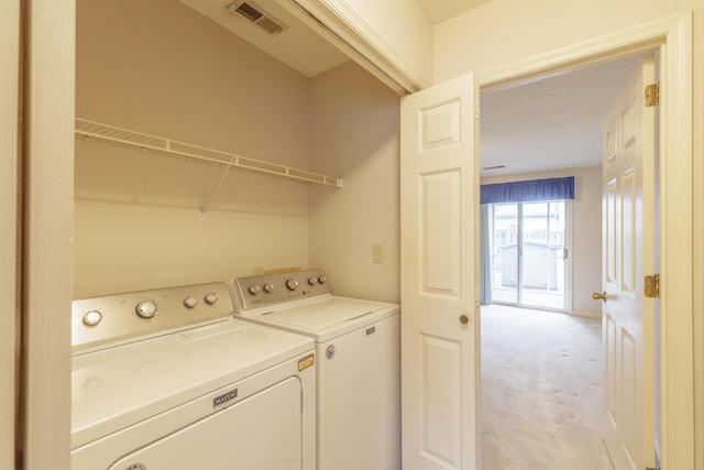 6580 Hickory Meadow Dr, Chattanooga, TN 37421 - washroom with washer and dryer and light colored carpet