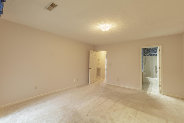 6580 Hickory Meadow Dr, Chattanooga, TN 37421 - unfurnished bedroom with a textured ceiling and light colored carpet