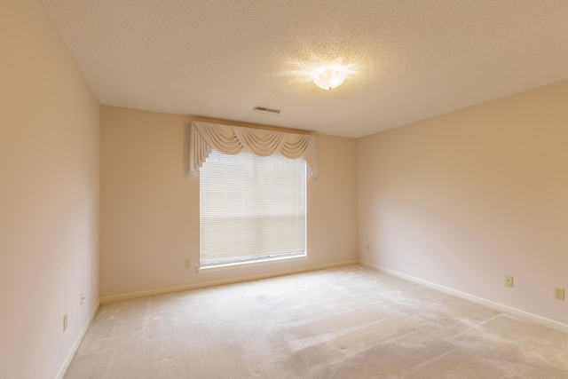 6580 Hickory Meadow Dr, Chattanooga, TN 37421 - empty room with light colored carpet and a textured ceiling
