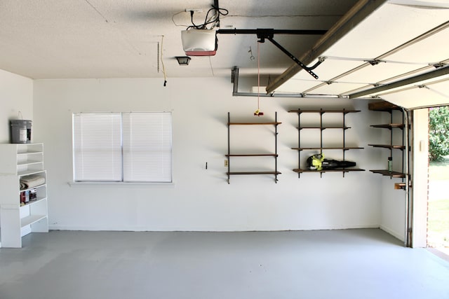 8257 Tiber Rd, Chattanooga, TN 37421 - garage with a garage door opener and baseboards