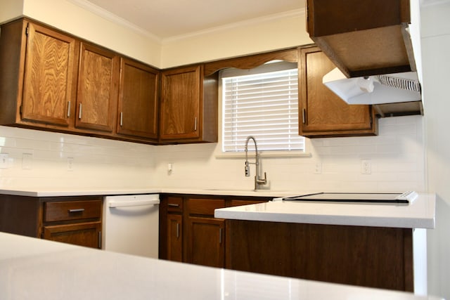 8257 Tiber Rd, Chattanooga, TN 37421 - kitchen with decorative backsplash, light countertops, ornamental molding, cooktop, and dishwasher