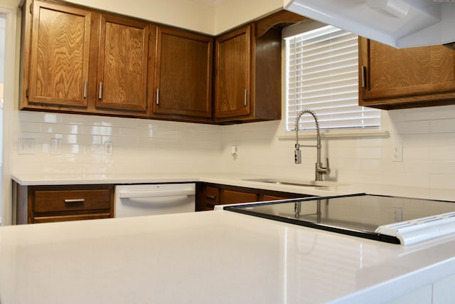 8257 Tiber Rd, Chattanooga, TN 37421 - kitchen with dishwasher, tasteful backsplash, and light countertops