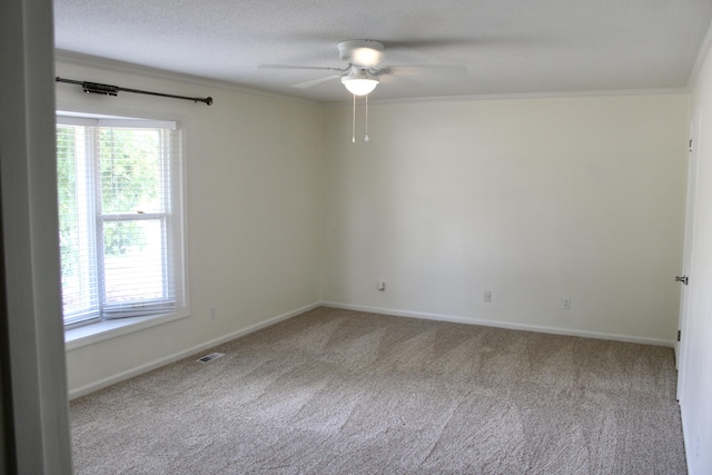 8257 Tiber Rd, Chattanooga, TN 37421 - empty room with a ceiling fan, carpet, ornamental molding, and healthy amount of natural light