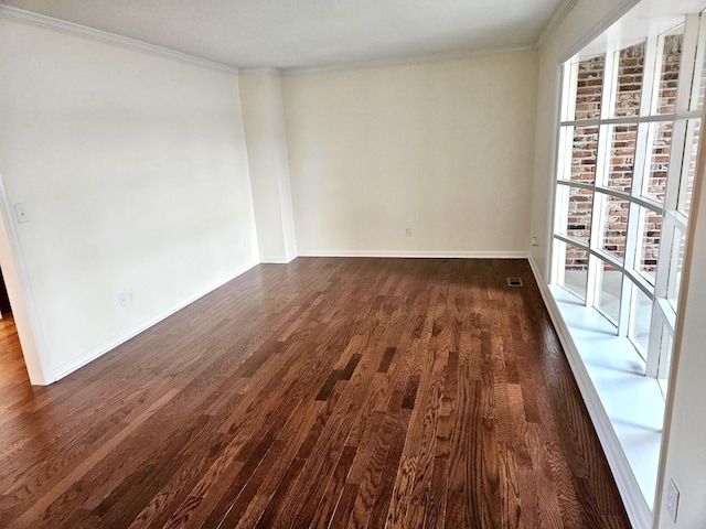 8257 Tiber Rd, Chattanooga, TN 37421 - spare room featuring dark wood-style flooring and crown molding