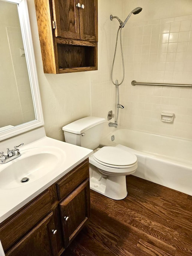 8257 Tiber Rd, Chattanooga, TN 37421 - bathroom with vanity, shower / washtub combination, and wood finished floors