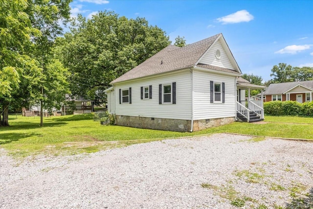 1 W 10th St, Chickamauga, GA 30707 - view of home's exterior featuring crawl space, a yard, and a shingled roof