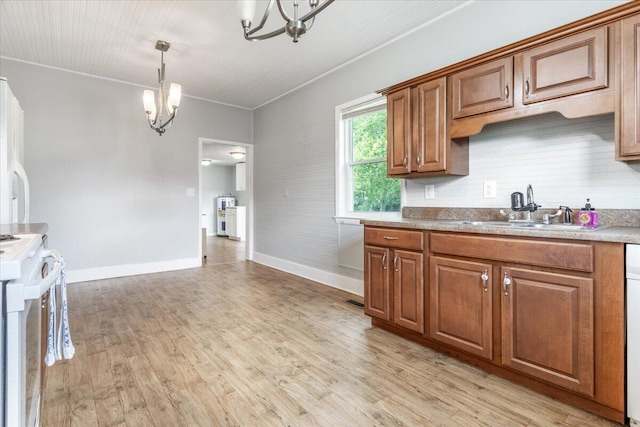 1 W 10th St, Chickamauga, GA 30707 - kitchen featuring a chandelier, white range oven, brown cabinets, light wood-style floors, and ornamental molding