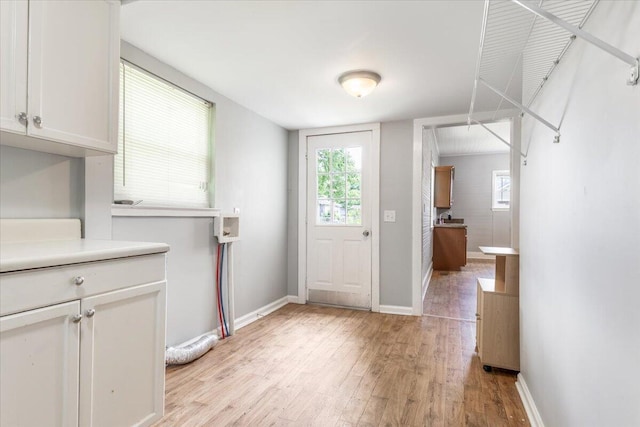 1 W 10th St, Chickamauga, GA 30707 - interior space featuring light wood-style flooring and baseboards