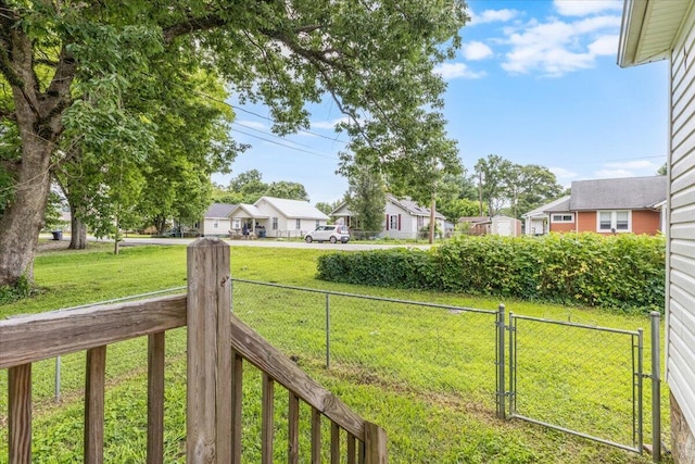 1 W 10th St, Chickamauga, GA 30707 - view of yard with a residential view and a gate