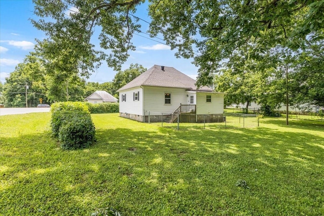 1 W 10th St, Chickamauga, GA 30707 - rear view of property with a shingled roof