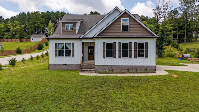 853 Dedmon Rd, Ringgold, GA 30736 - view of front of home featuring crawl space, board and batten siding, and roof with shingles