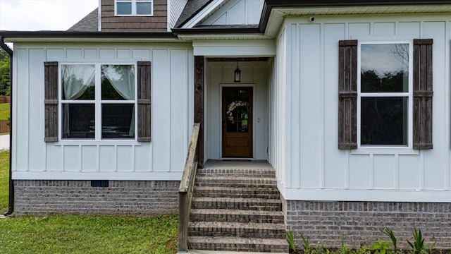 853 Dedmon Rd, Ringgold, GA 30736 - property entrance with board and batten siding and crawl space
