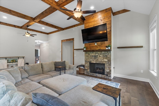 853 Dedmon Rd, Ringgold, GA 30736 - living area with a ceiling fan, dark wood-type flooring, a fireplace, coffered ceiling, and beam ceiling
