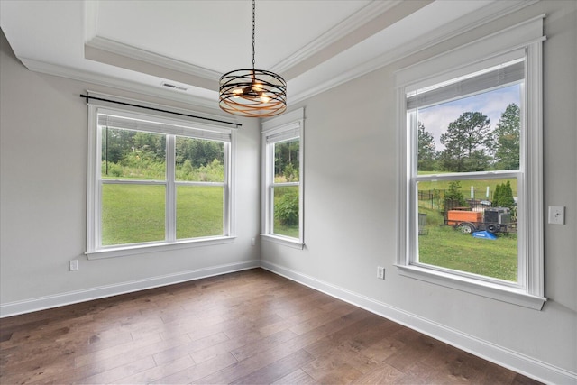 853 Dedmon Rd, Ringgold, GA 30736 - spare room with crown molding, a chandelier, dark wood-style flooring, and a raised ceiling