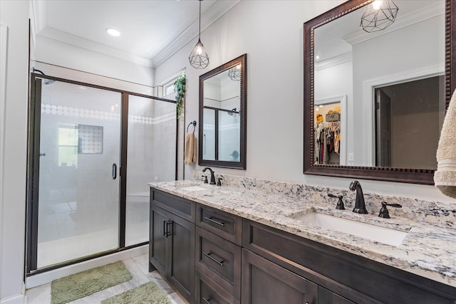 853 Dedmon Rd, Ringgold, GA 30736 - bathroom featuring crown molding, a stall shower, double vanity, a walk in closet, and recessed lighting