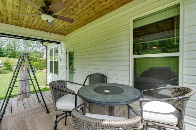 853 Dedmon Rd, Ringgold, GA 30736 - deck with ceiling fan and outdoor dining area
