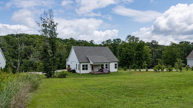 853 Dedmon Rd, Ringgold, GA 30736 - view of front of property with a front lawn, a wooden deck, and a view of trees