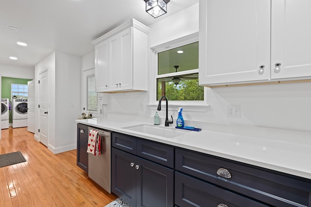 111 Oak Meadow Dr, Dunlap, TN 37327 - kitchen featuring washing machine and clothes dryer, dishwasher, white cabinetry, light wood-style floors, and light countertops