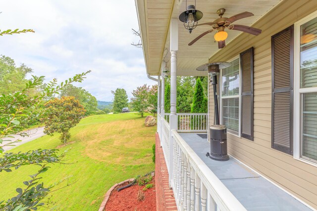 199 Falcons View Dr, Ringgold, GA 30736 - view of green lawn featuring a porch and ceiling fan