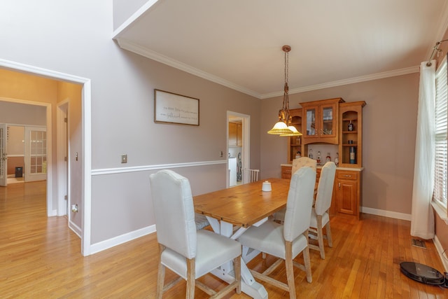199 Falcons View Dr, Ringgold, GA 30736 - dining area with light wood-type flooring and ornamental molding
