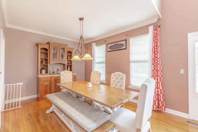 199 Falcons View Dr, Ringgold, GA 30736 - dining room featuring light wood finished floors and ornamental molding