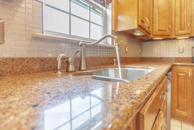 199 Falcons View Dr, Ringgold, GA 30736 - kitchen with tasteful backsplash, light stone counters, and light tile patterned floors