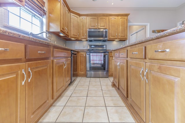199 Falcons View Dr, Ringgold, GA 30736 - kitchen with appliances with stainless steel finishes, tasteful backsplash, light tile patterned floors, stone countertops, and crown molding