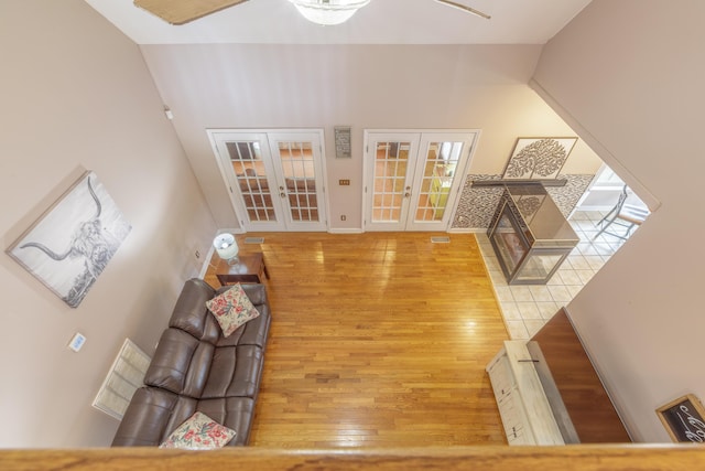 199 Falcons View Dr, Ringgold, GA 30736 - living room with french doors, wood finished floors, high vaulted ceiling, and a ceiling fan