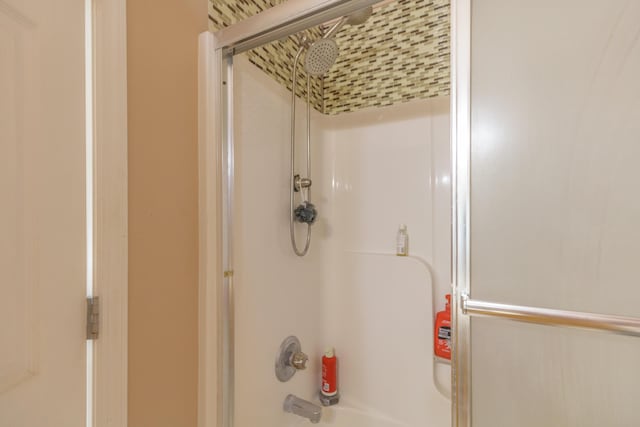 199 Falcons View Dr, Ringgold, GA 30736 - bathroom featuring shower / bath combination with glass door