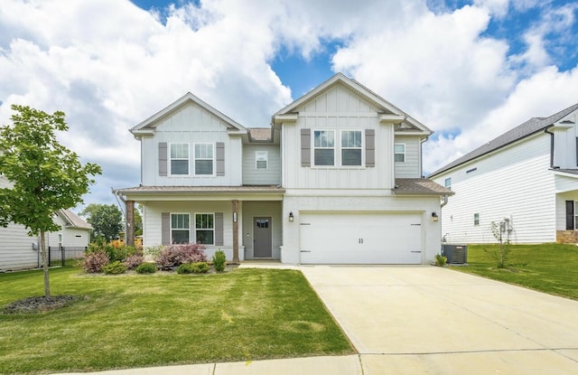 3309 Grassy Fields Ln, Apison, TN 37302 - craftsman-style house featuring board and batten siding, a garage, driveway, and covered porch