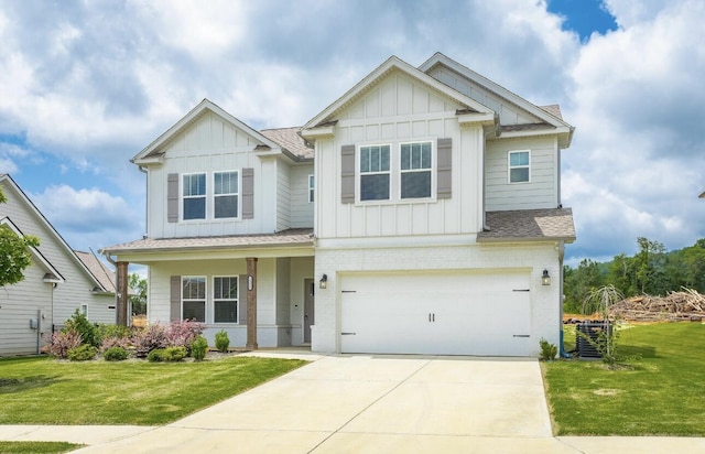 3309 Grassy Fields Ln, Apison, TN 37302 - craftsman inspired home with board and batten siding, a garage, a front lawn, concrete driveway, and a shingled roof