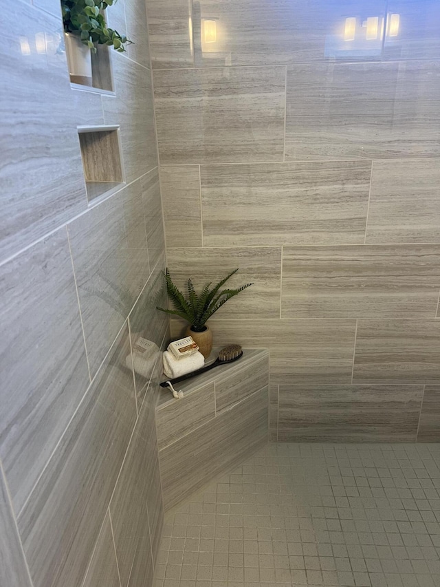 3309 Grassy Fields Ln, Apison, TN 37302 - bathroom featuring tiled shower and tile patterned floors