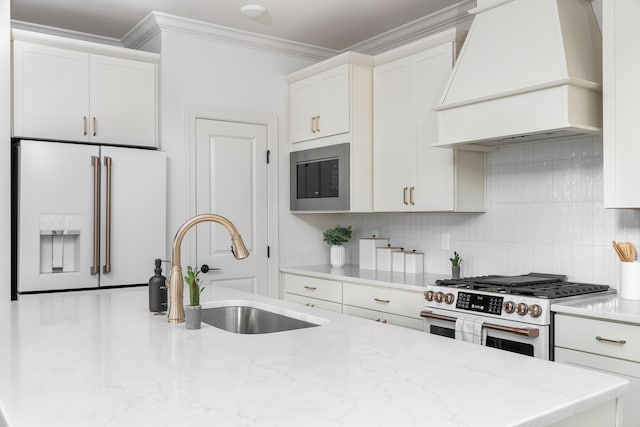 1399 Little Sorrel Rd Unit 30, Hixson, TN 37343 - kitchen with custom range hood, white fridge with ice dispenser, stainless steel microwave, range with gas cooktop, and tasteful backsplash