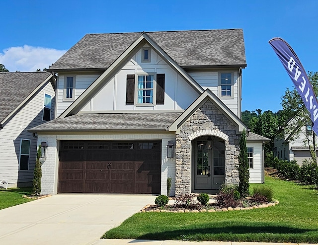 1399 Little Sorrel Rd Unit 30, Hixson, TN 37343 - tudor house with a front yard, driveway, a garage, and stone siding