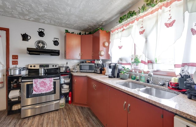1339 Woodmore Ln, Chattanooga, TN 37411 - kitchen with stainless steel appliances, dark wood-type flooring, under cabinet range hood, plenty of natural light, and a textured ceiling