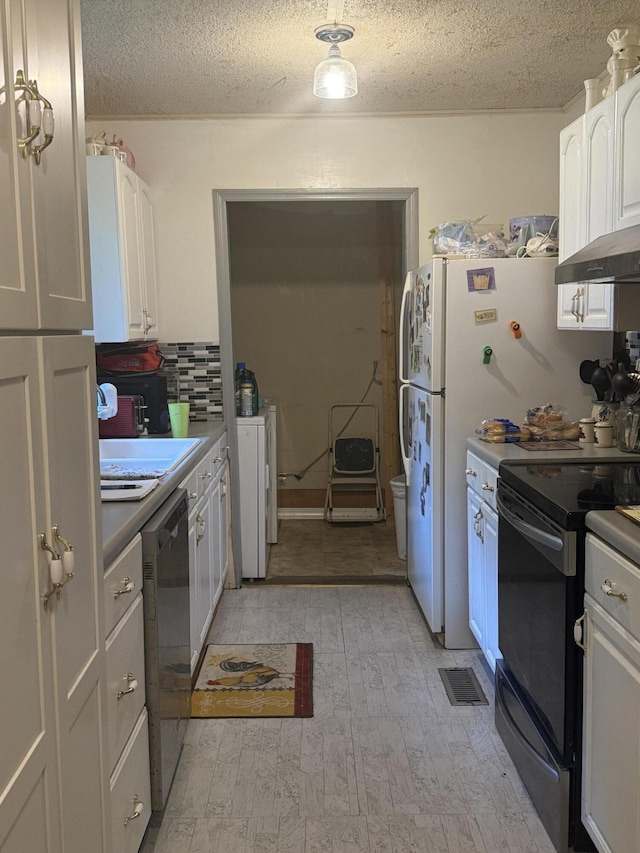 1661 W Francis Spring Rd, Whitwell, TN 37397 - kitchen featuring black electric range oven, under cabinet range hood, a textured ceiling, dishwasher, and white cabinets