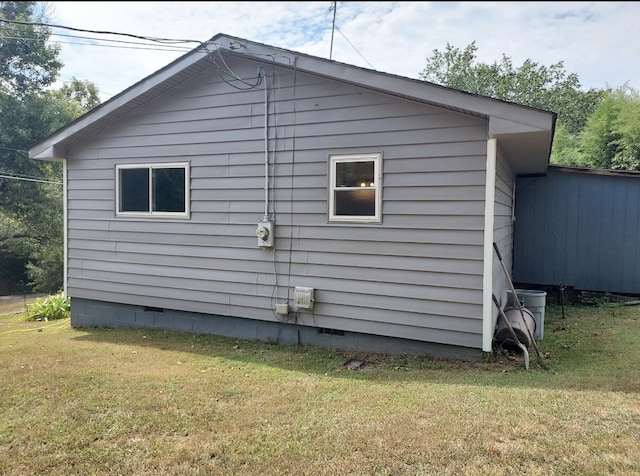 1661 W Francis Spring Rd, Whitwell, TN 37397 - view of side of home with crawl space and a lawn
