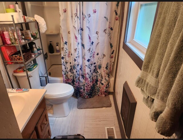 1661 W Francis Spring Rd, Whitwell, TN 37397 - full bathroom featuring vanity, shower / tub combo, and wood finished floors