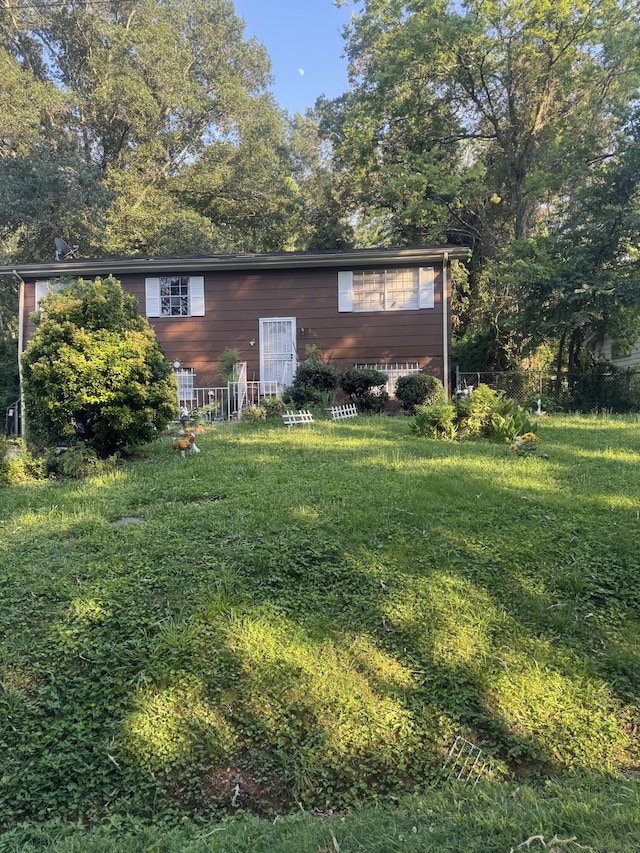 3024 Lightfoot Mill Rd, Chattanooga, TN 37406 - back of property featuring a lawn